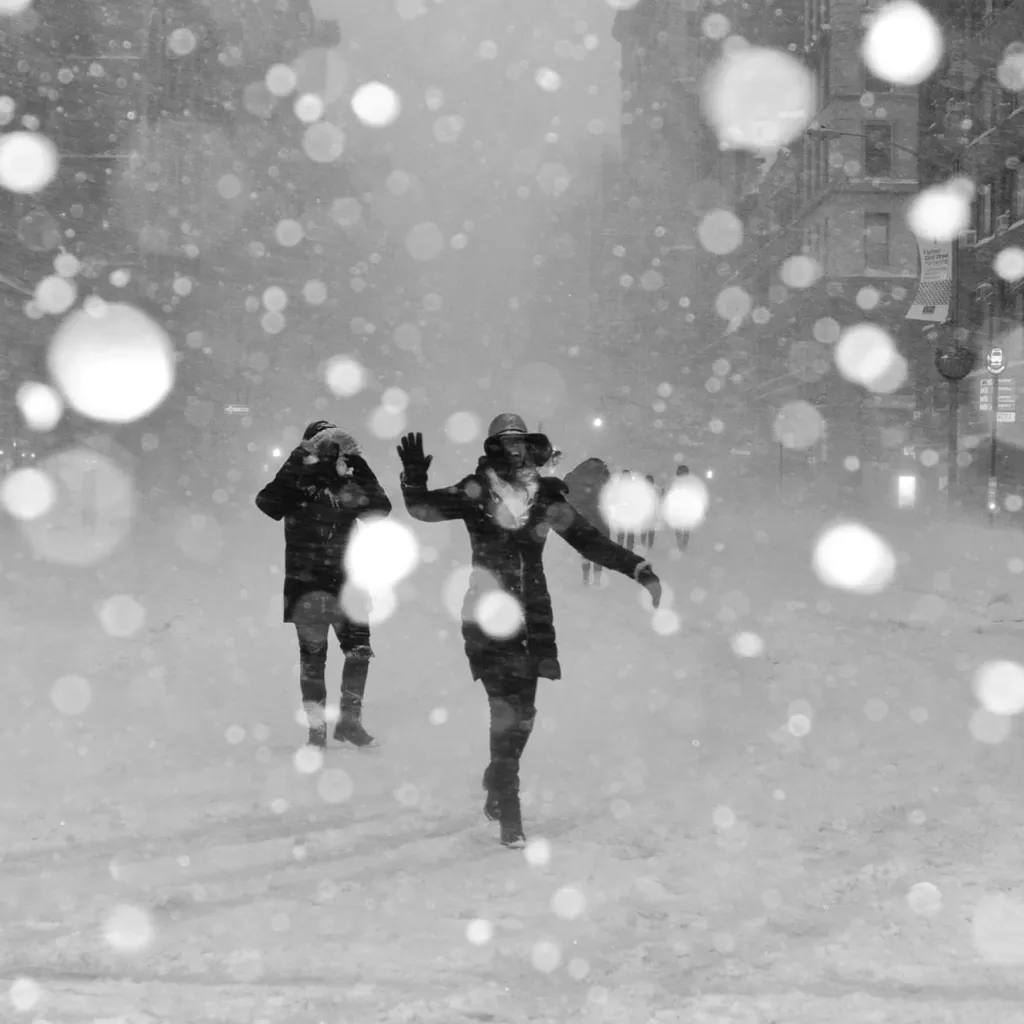 A couple having fun in snow.